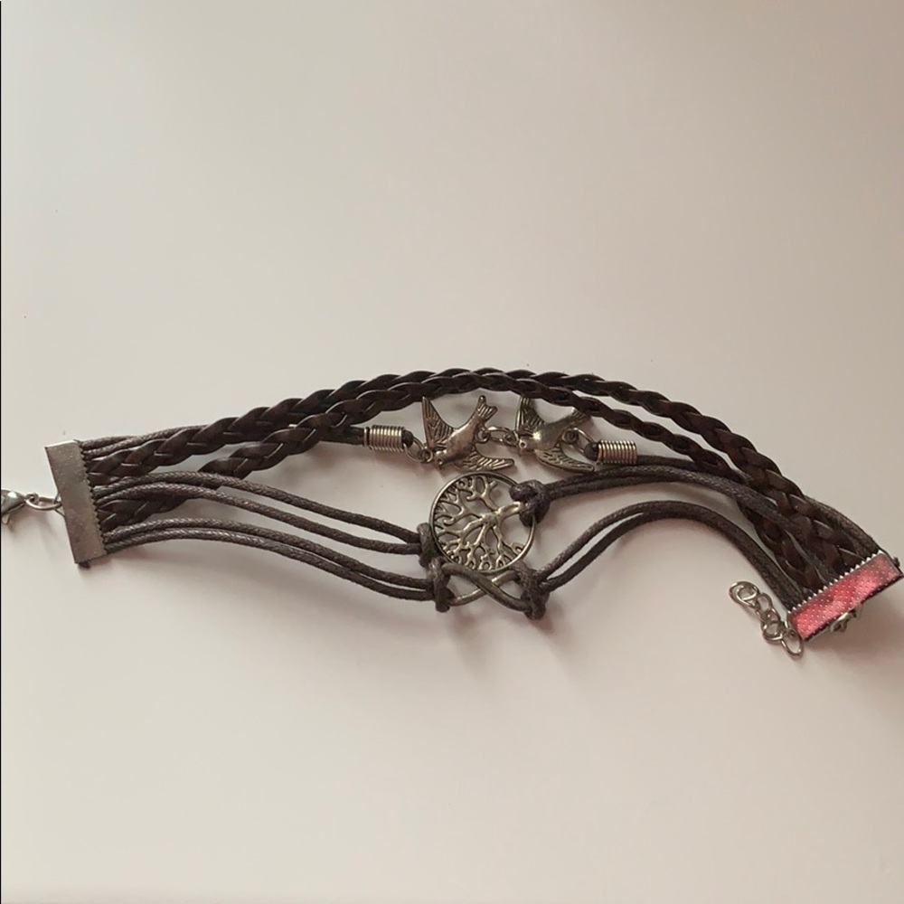 Leather bracelet with silver charms